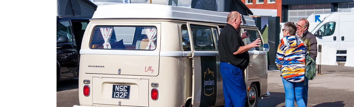 Jordans Leisure team helping customers choose a campervan