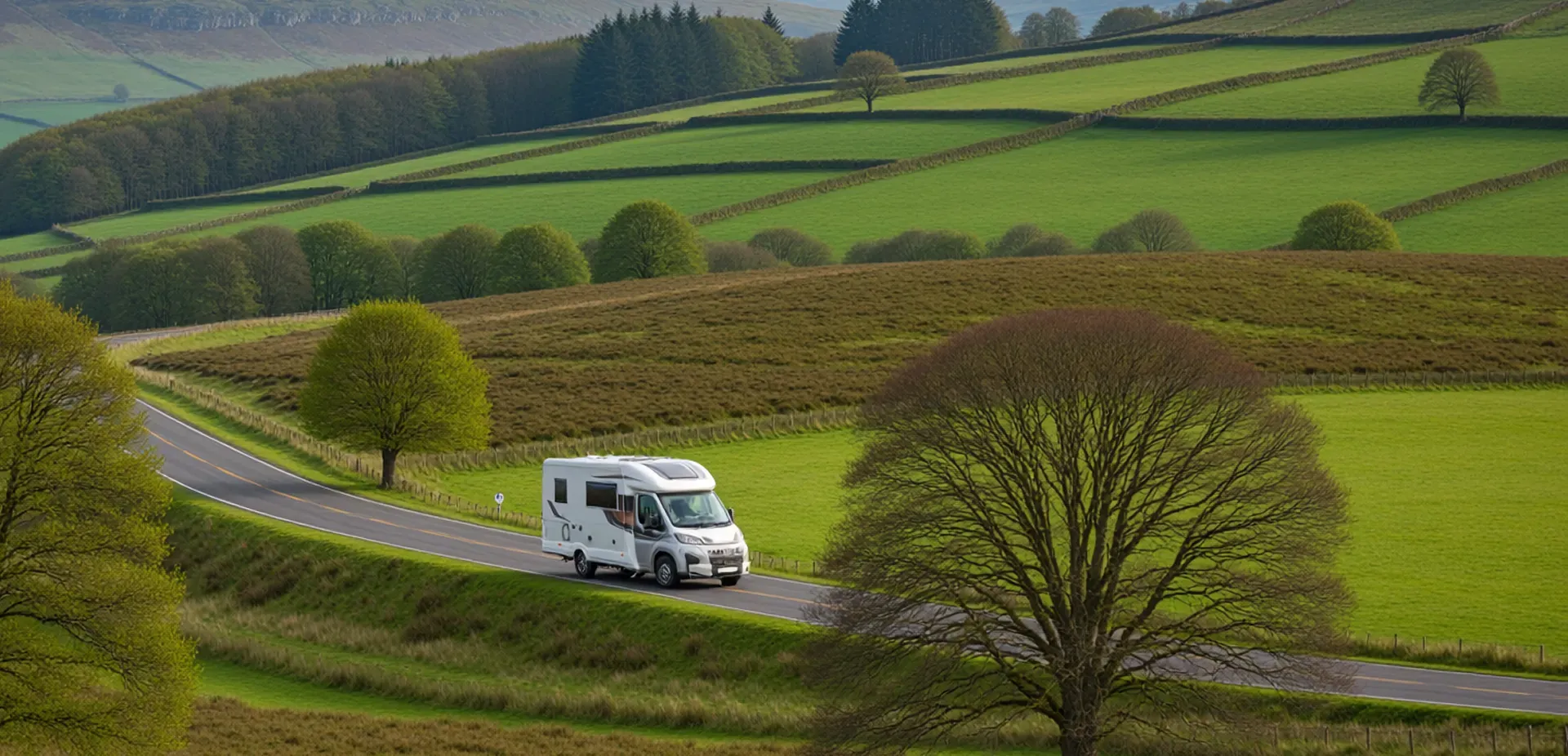 A motorhome travelling along a country road